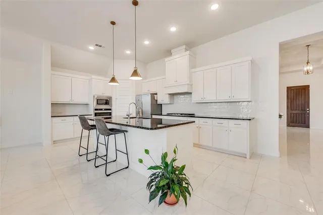 a living room with furniture wooden floor and a window