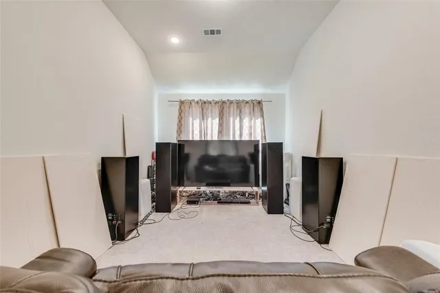 a view of a hallway with entryway