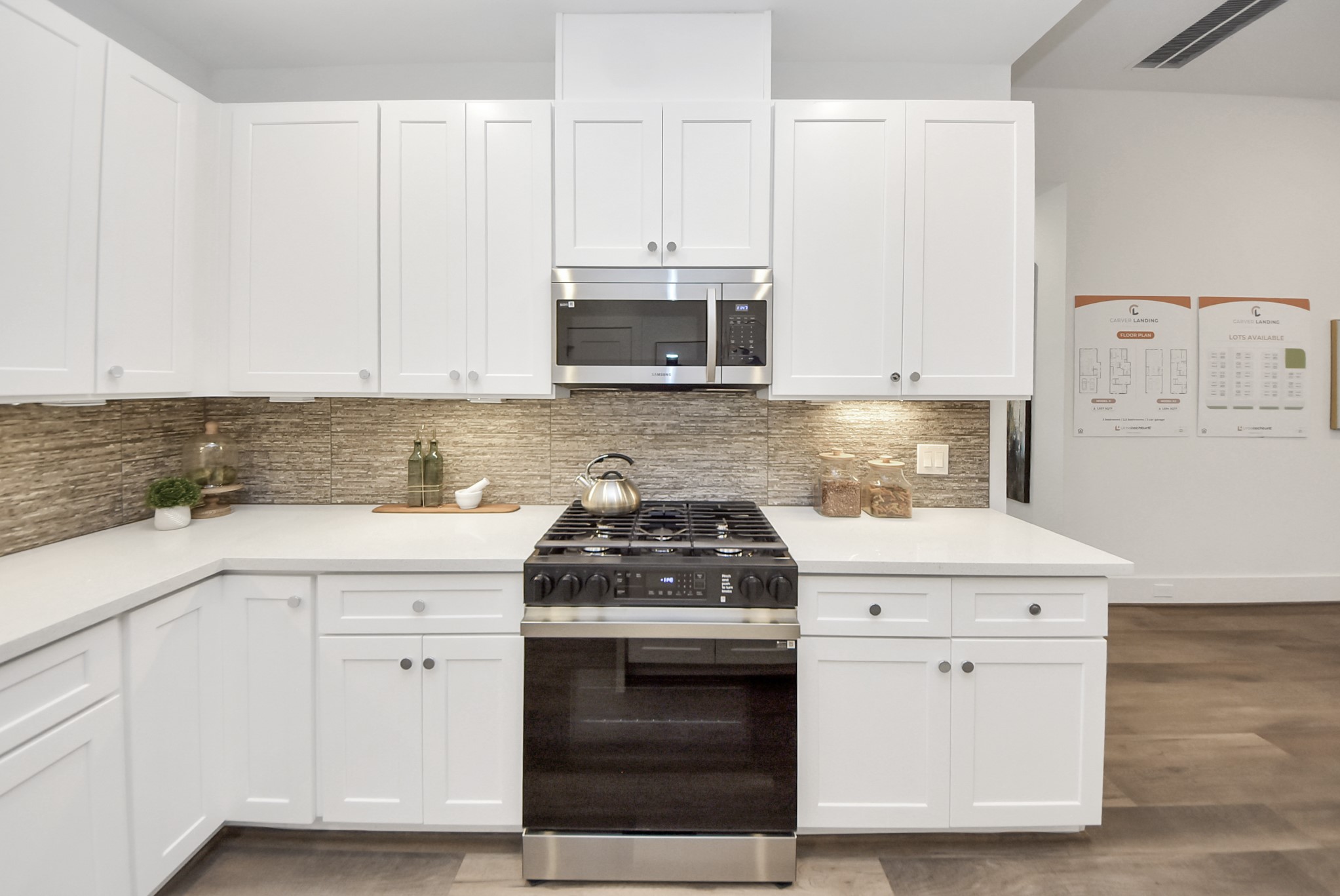 7504 Carver Road, Unit D Houston, TX 77088 - Photo 21 of 49 a kitchen with appliances a stove and cabinets