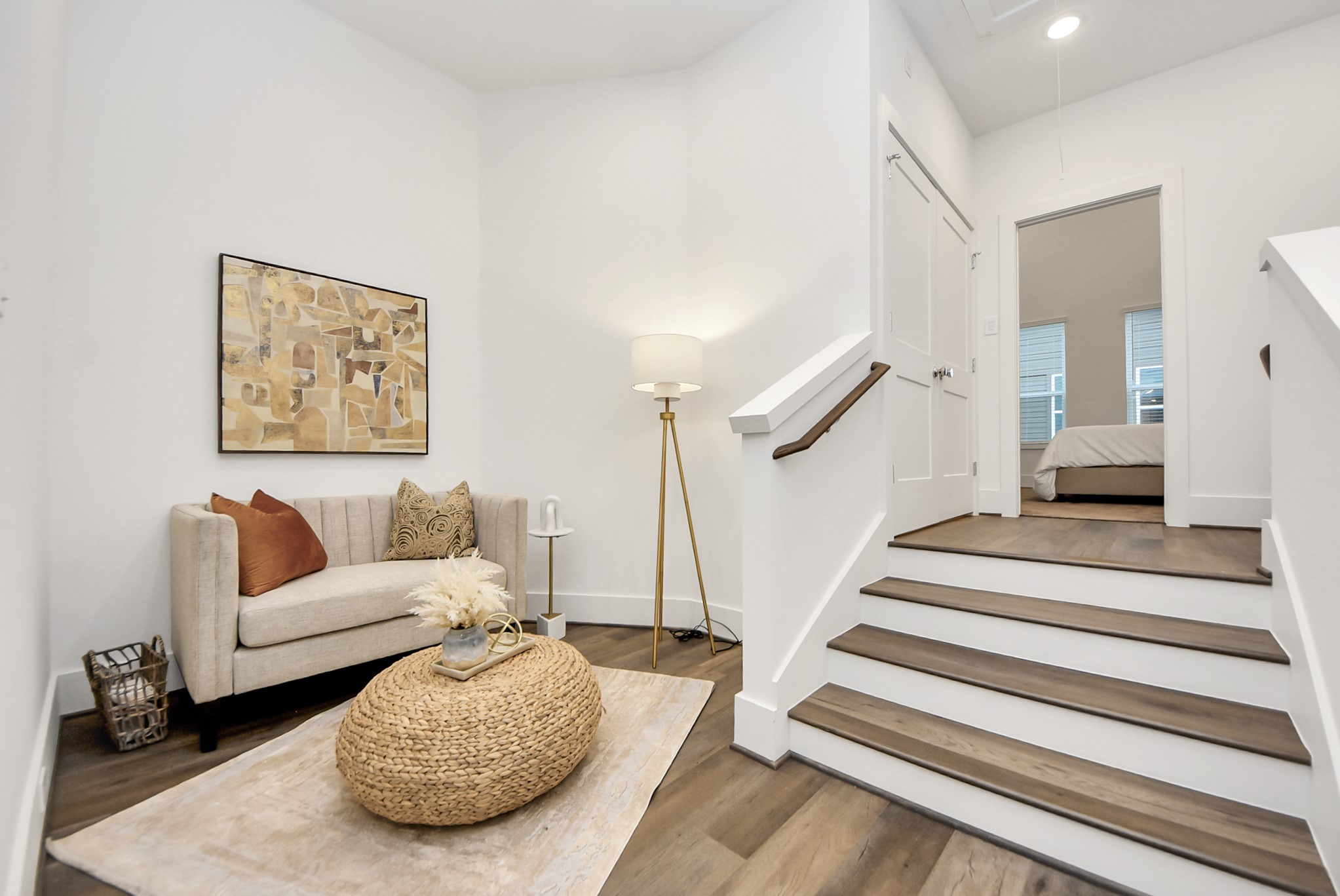 7504 Carver Road, Unit D Houston, TX 77088 - Photo 23 of 49 a living room with furniture and a wooden floor