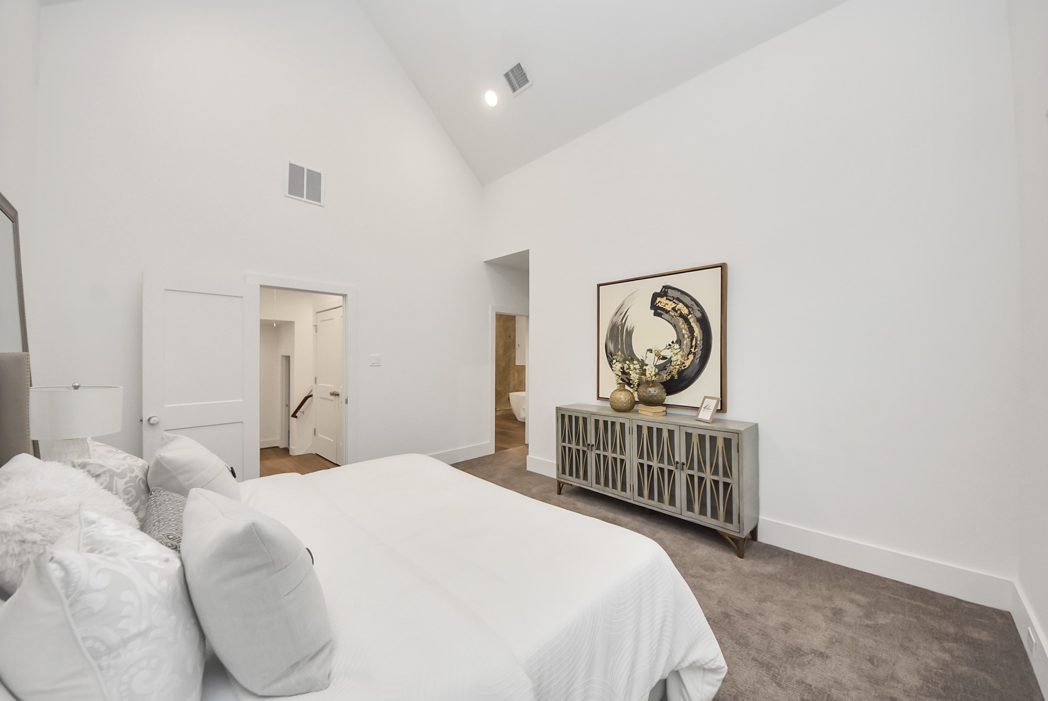 7504 Carver Road, Unit D Houston, TX 77088 - Photo 27 of 49 a bedroom with a bed and a window