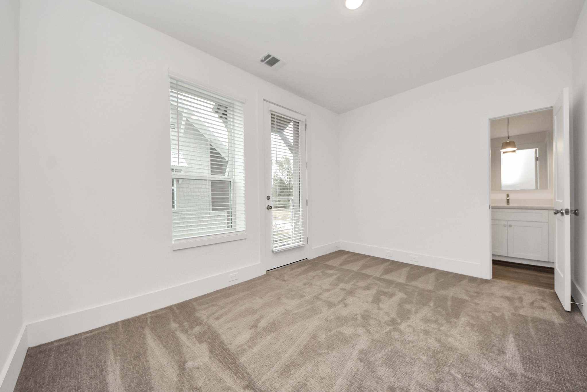 7504 Carver Road, Unit D Houston, TX 77088 - Photo 40 of 49 a view of an empty room with a window