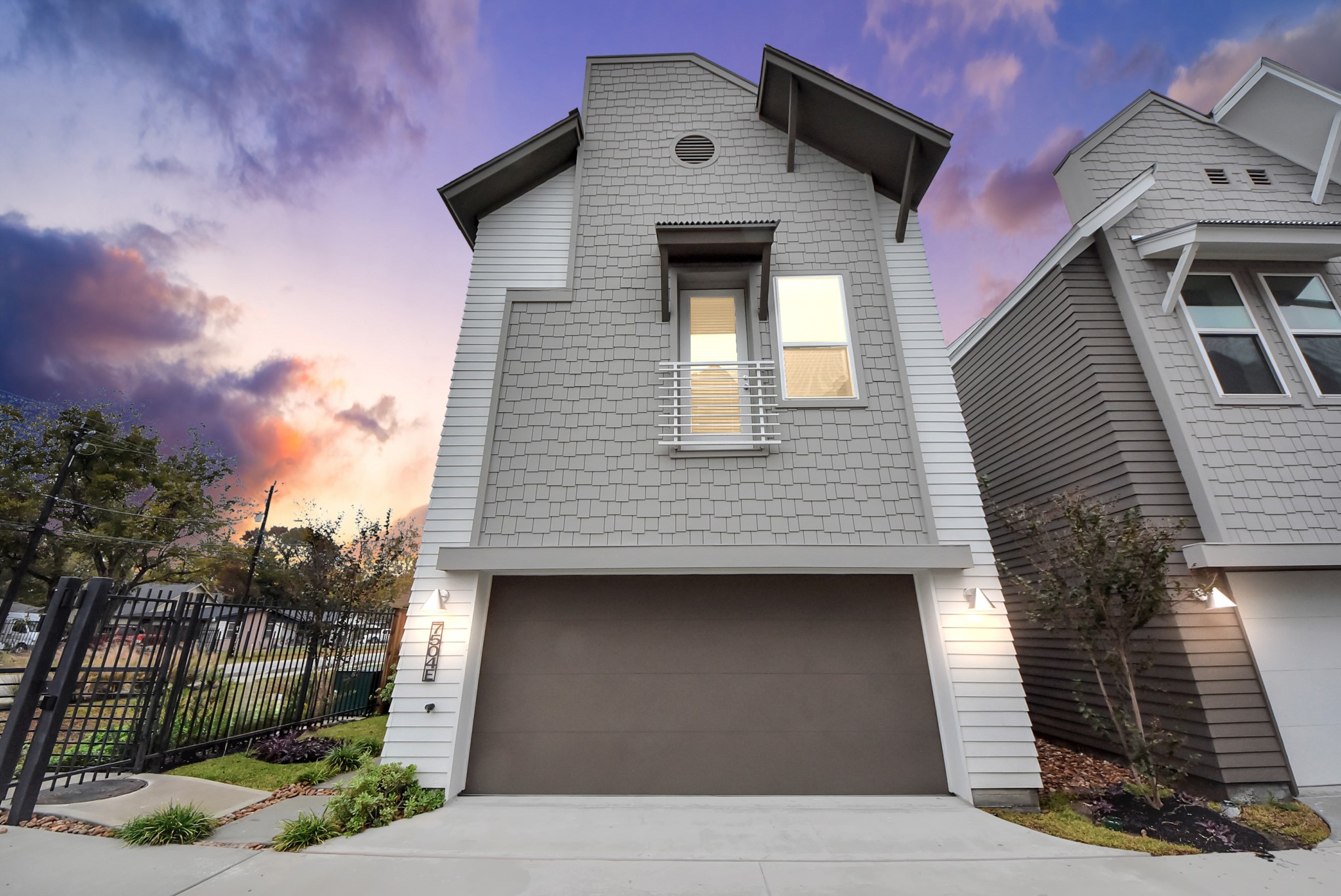 7504 Carver Road, Unit D Houston, TX 77088 - Photo 46 of 49 a front view of a house with garage