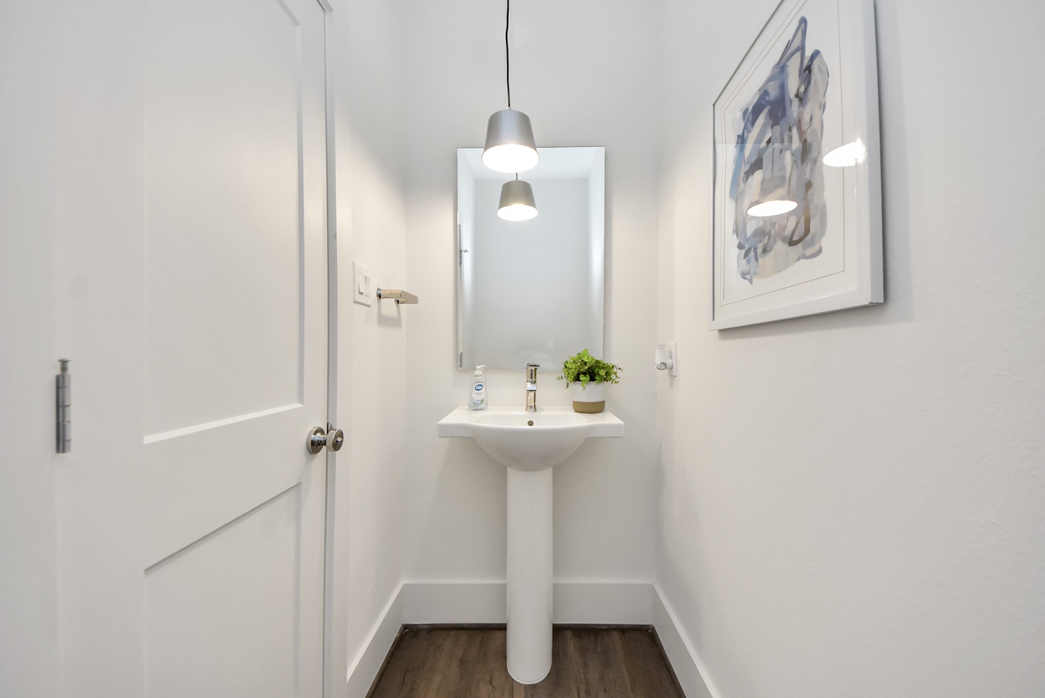 7504 Carver Road, Unit D Houston, TX 77088 - Photo 5 of 49 a bathroom with a sink and glass door