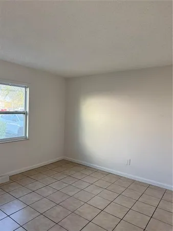 an empty room with a window