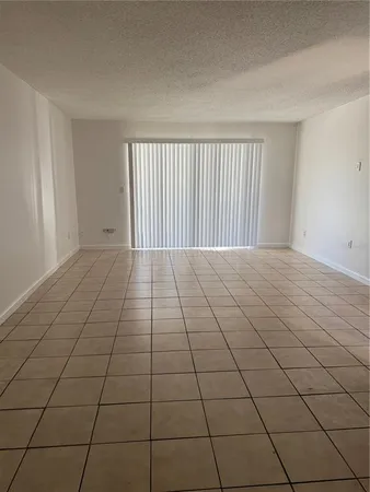 a view of a room and window