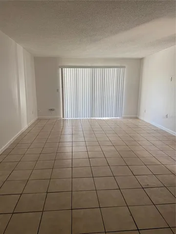 a view of a room and window
