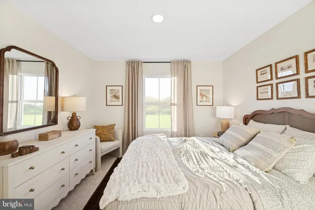 a bedroom with double bed and a window