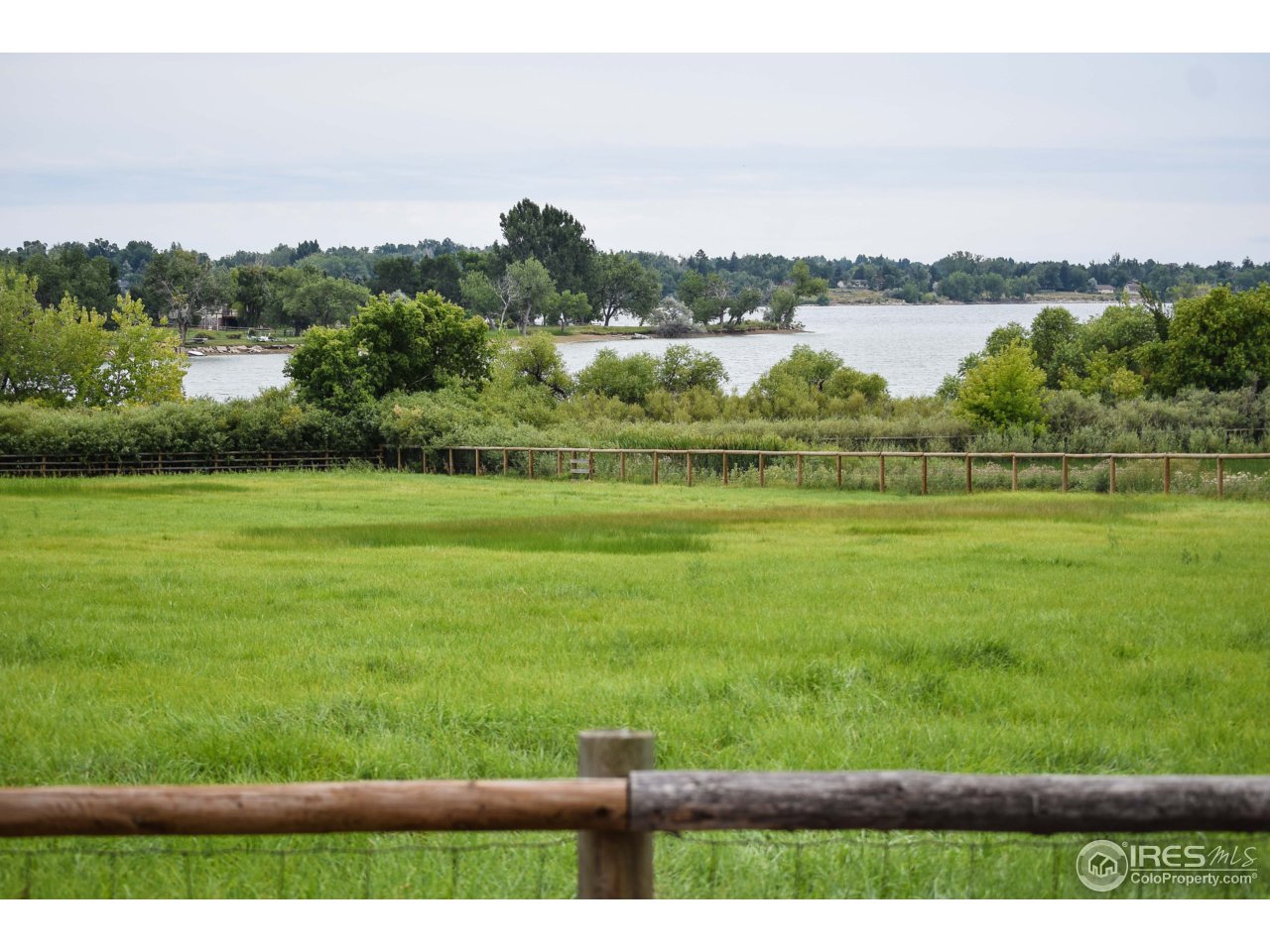 3501 Bayshore Road Fort Collins, CO 80524 - Photo 14 of 25 a view of a lake with a city