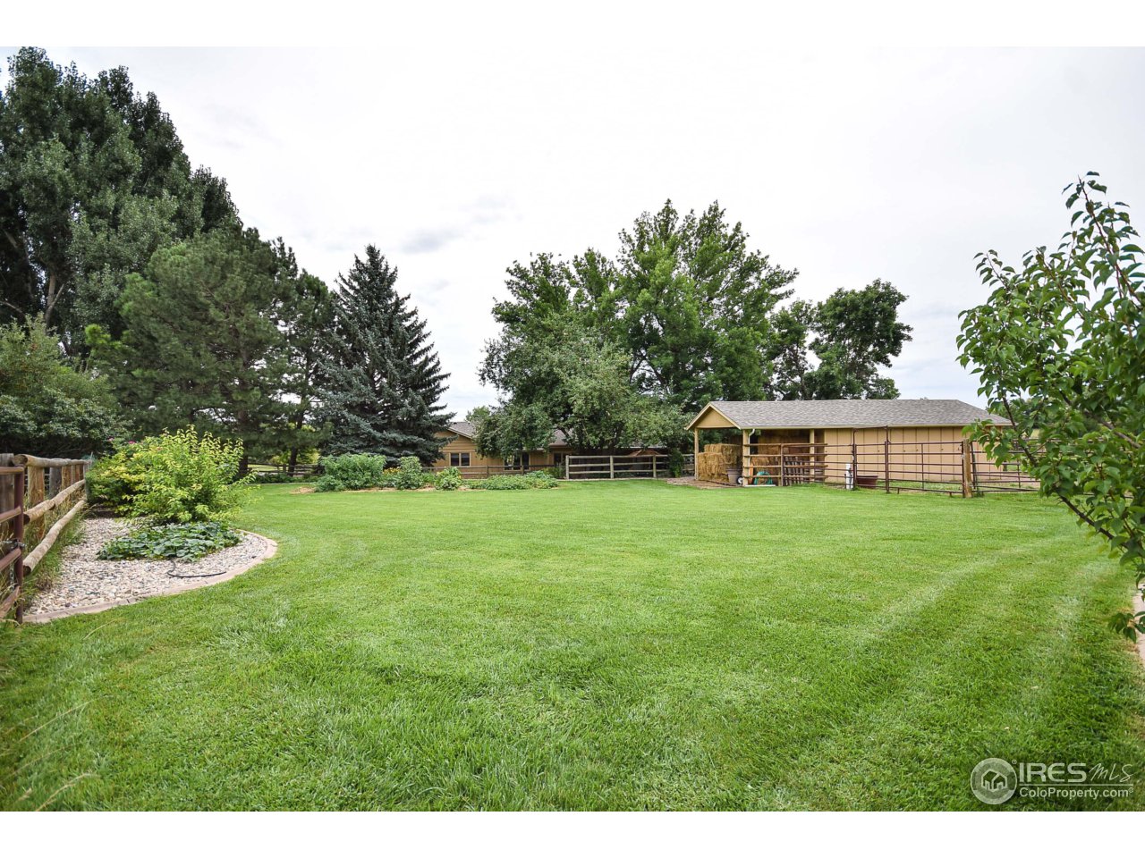 3501 Bayshore Road Fort Collins, CO 80524 - Photo 18 of 25 a view of a big yard with a house