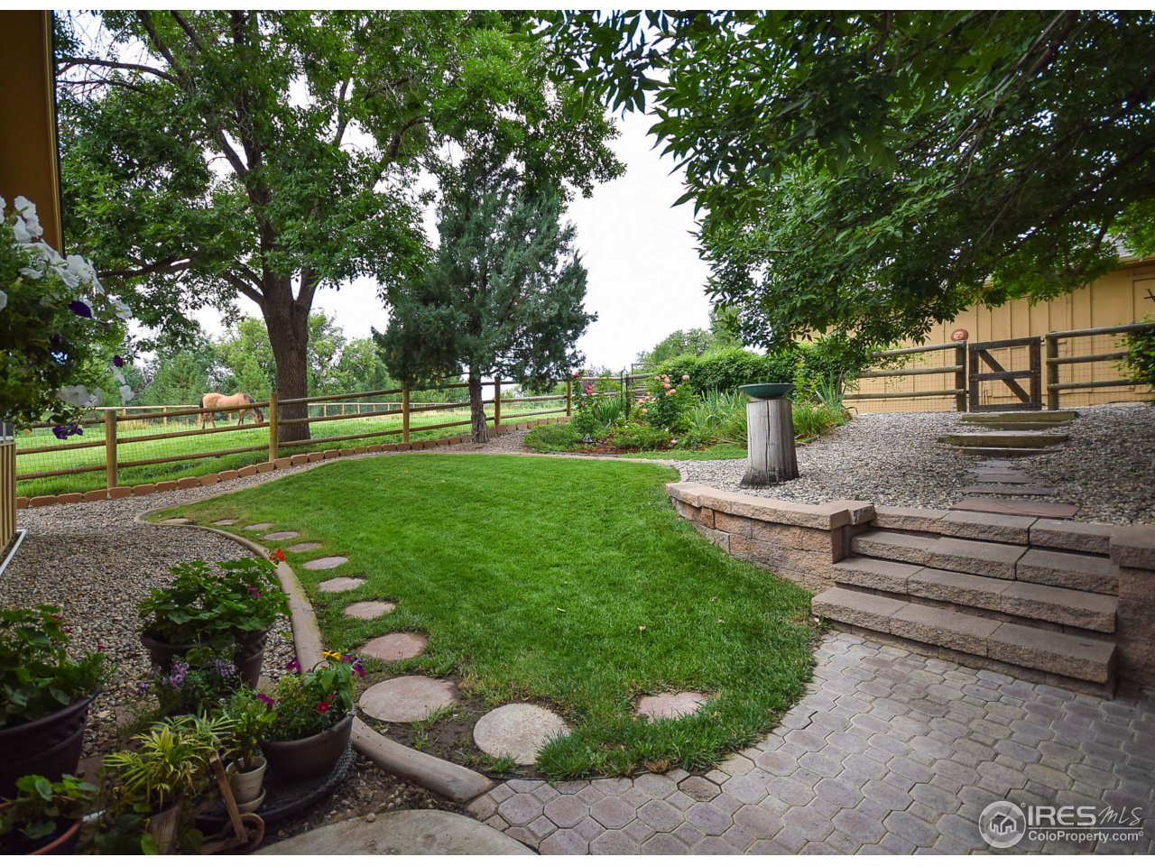 3501 Bayshore Road Fort Collins, CO 80524 - Photo 20 of 25 a garden view with a seating space