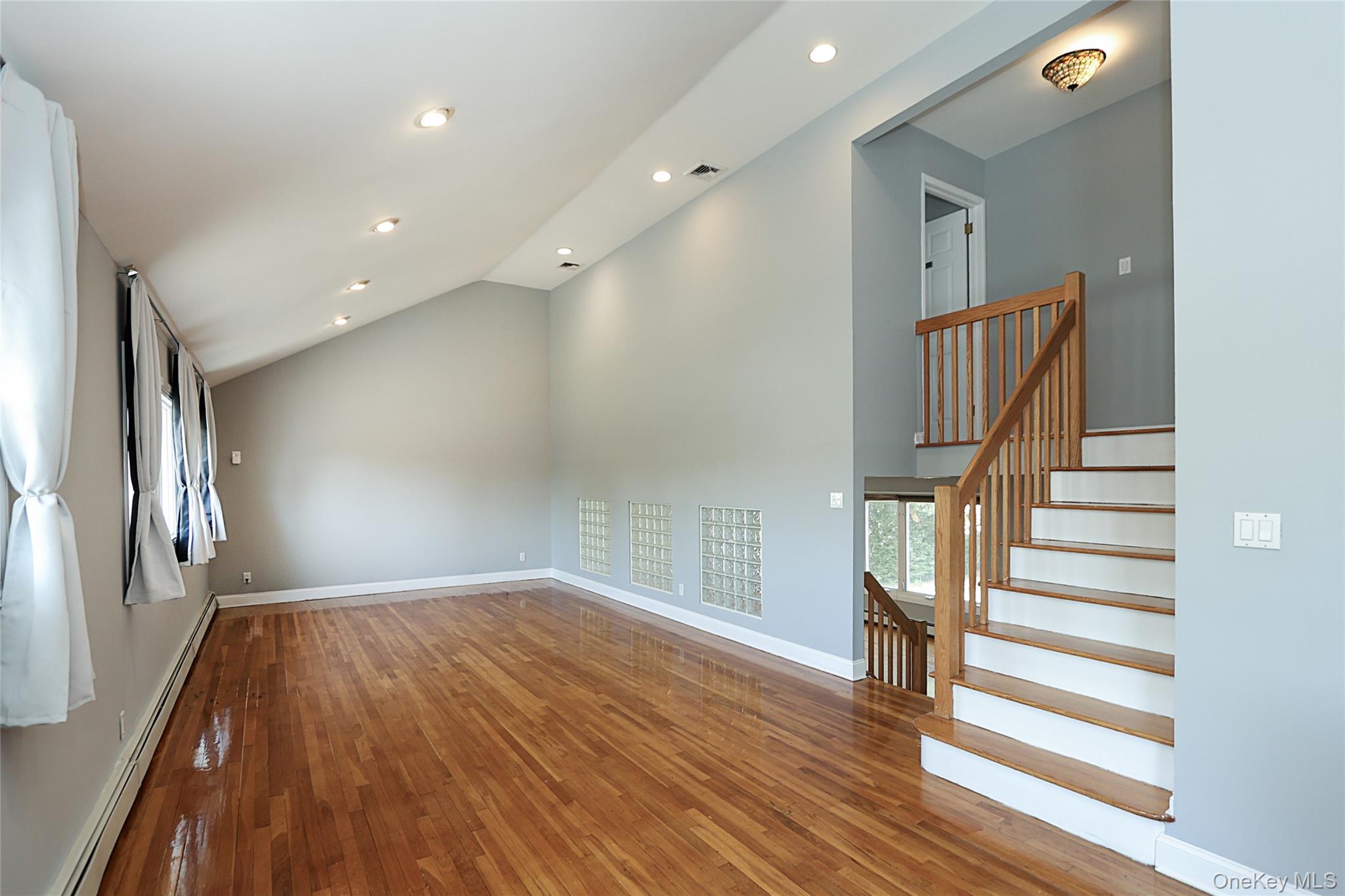874 Seamans Nck Road Wantagh, NY 11793 - Photo 12 of 39 a view of entryway with wooden floor