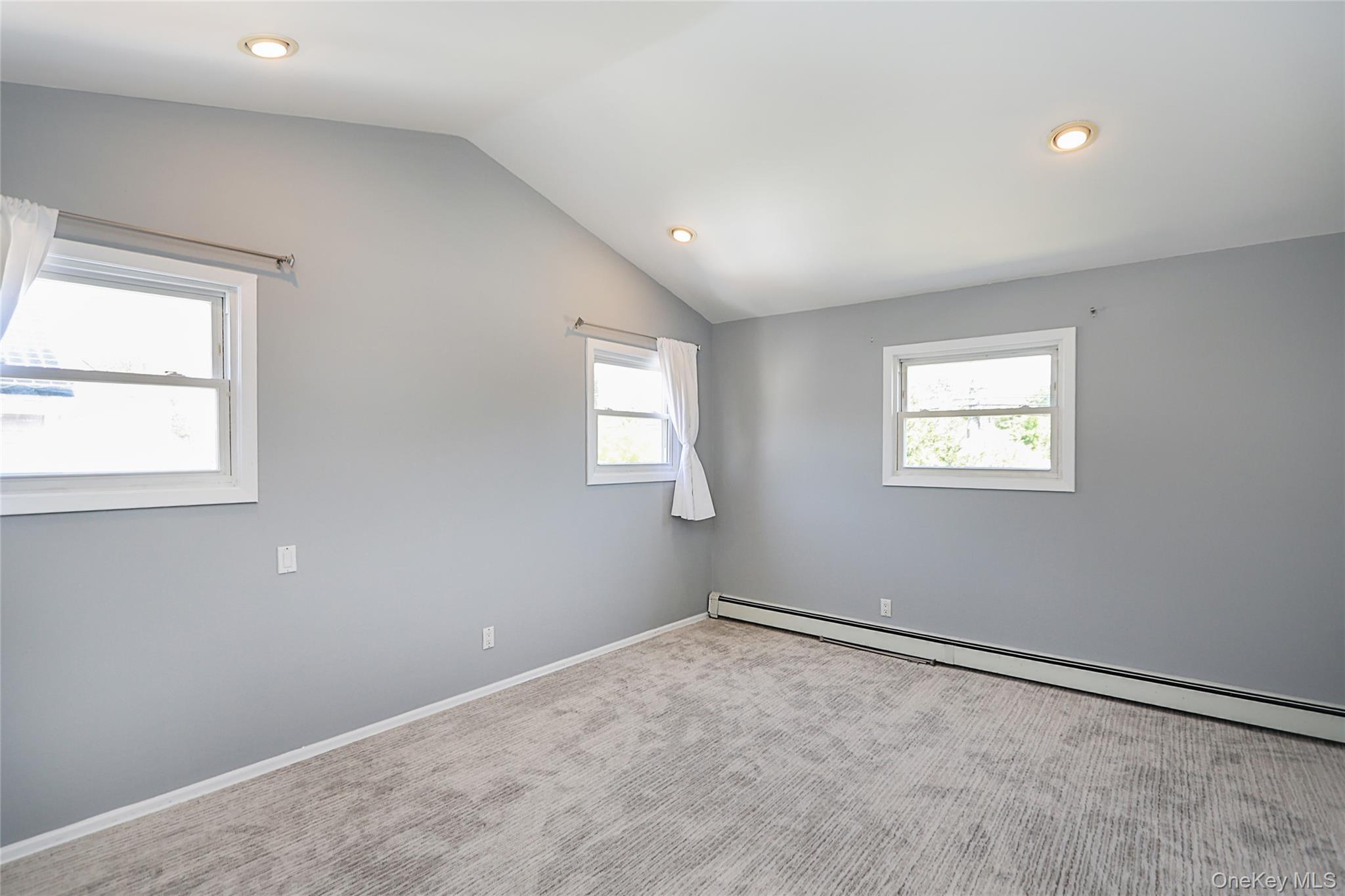 874 Seamans Nck Road Wantagh, NY 11793 - Photo 20 of 39 an empty room with windows