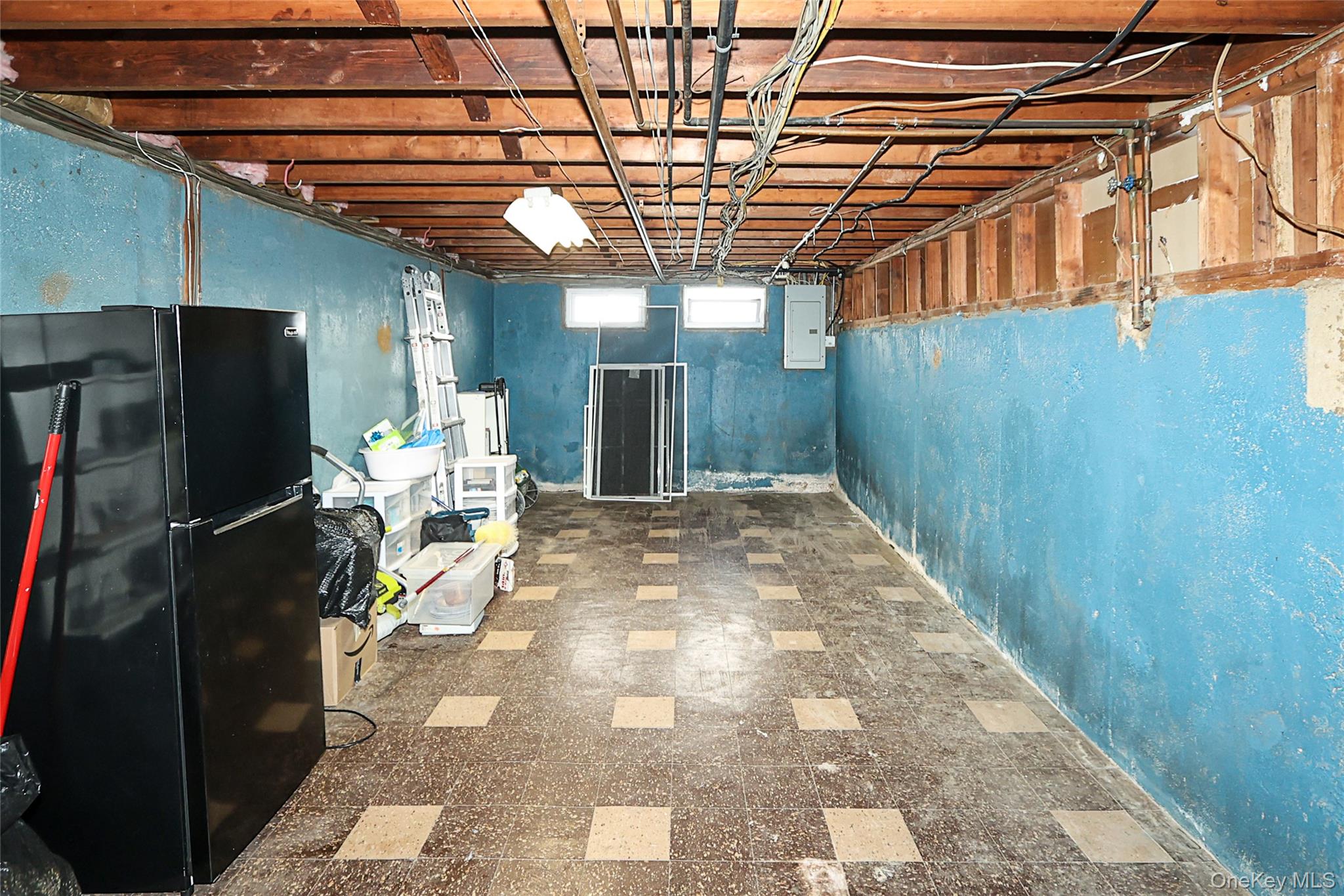 874 Seamans Nck Road Wantagh, NY 11793 - Photo 26 of 39 a view of a porch with wooden floor and a refrigerator