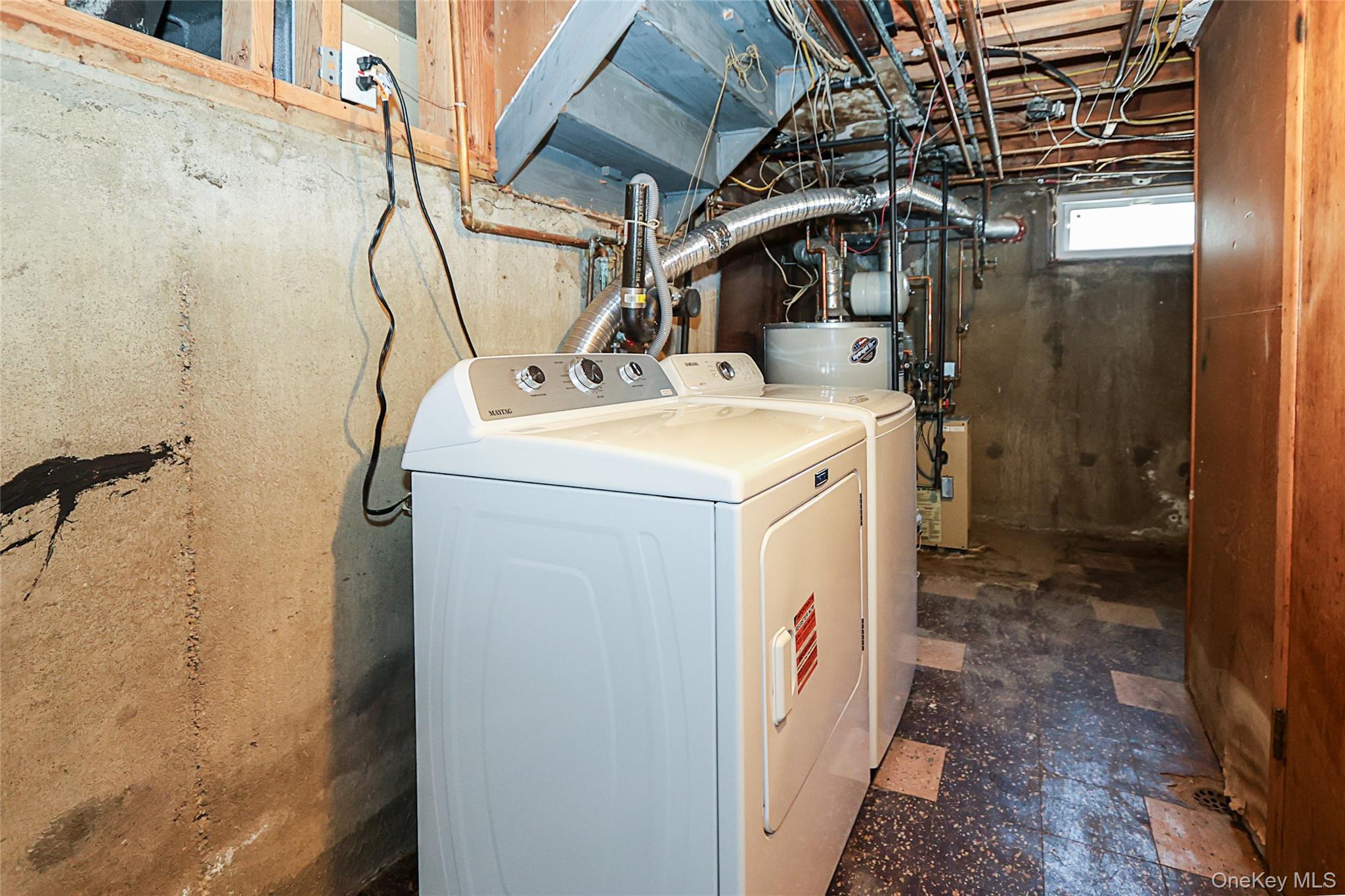 874 Seamans Nck Road Wantagh, NY 11793 - Photo 27 of 39 a utility room with dryer and washer