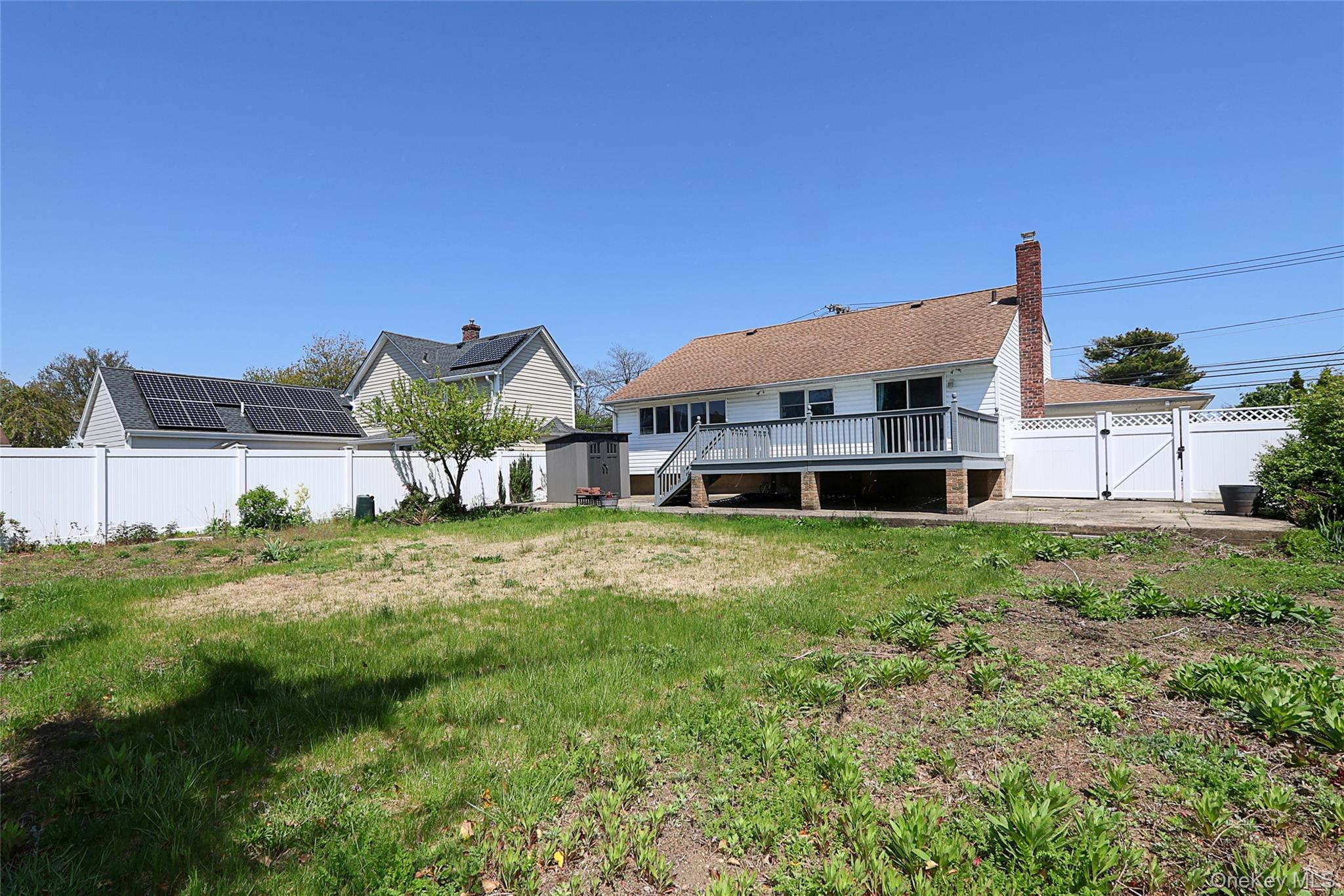 874 Seamans Nck Road Wantagh, NY 11793 - Photo 34 of 39 a front view of house with yard
