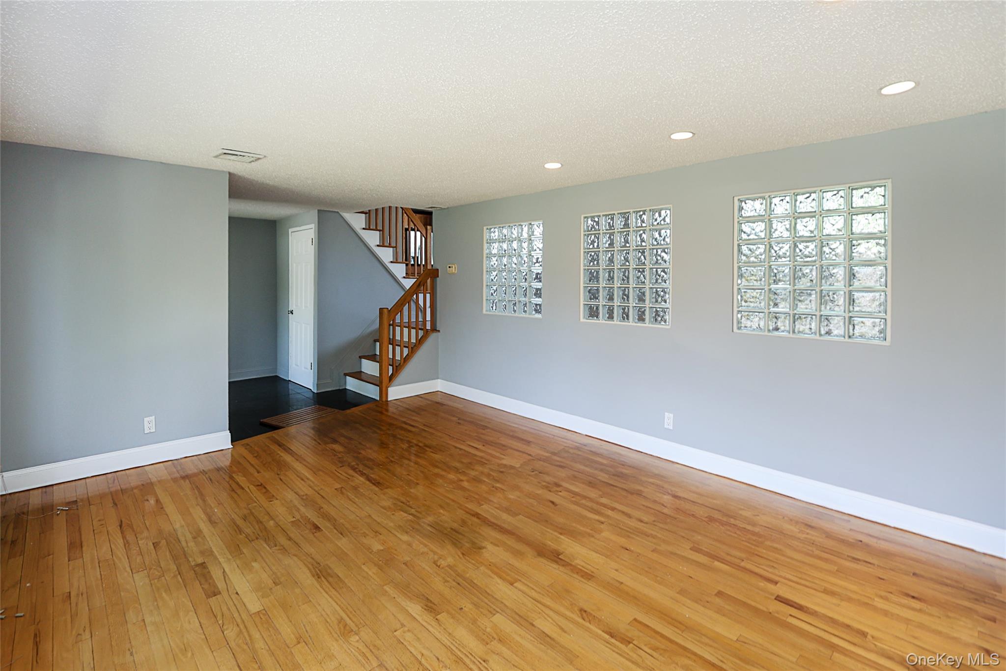 874 Seamans Nck Road Wantagh, NY 11793 - Photo 8 of 39 a view of an empty room with windows