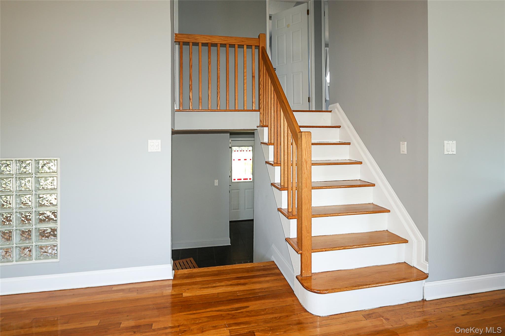 874 Seamans Nck Road Wantagh, NY 11793 - Photo 10 of 39 a view of entryway and hall with wooden floor
