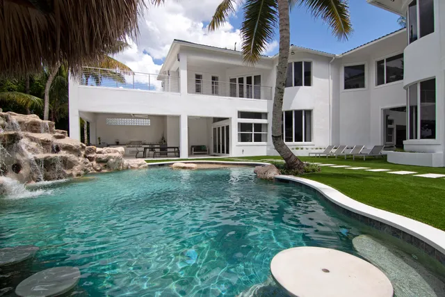 a view of a house with a swimming pool
