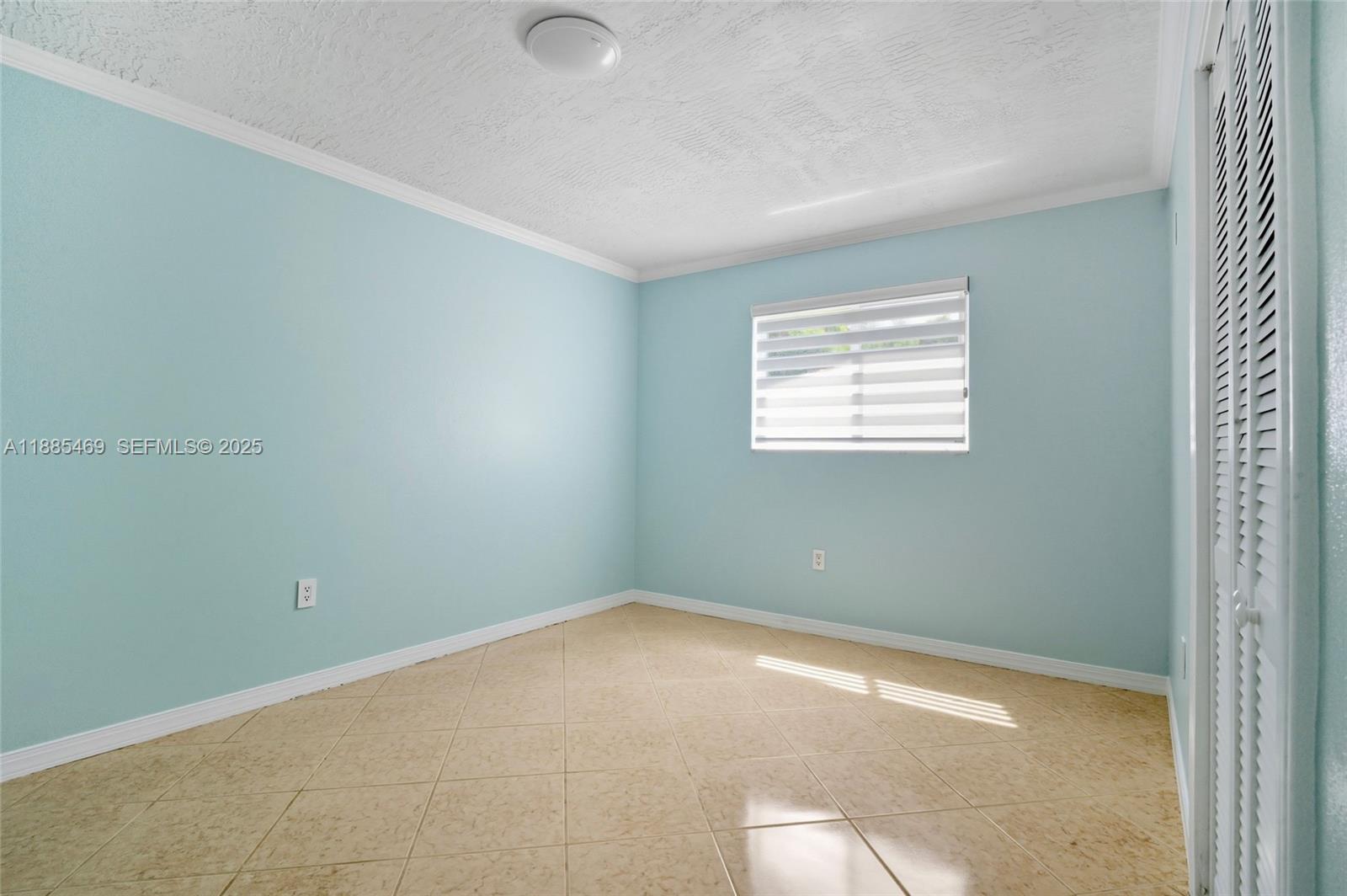 9710 Sunset Strip Sunrise, FL 33322 - Photo 20 of 33 Second Bedroom