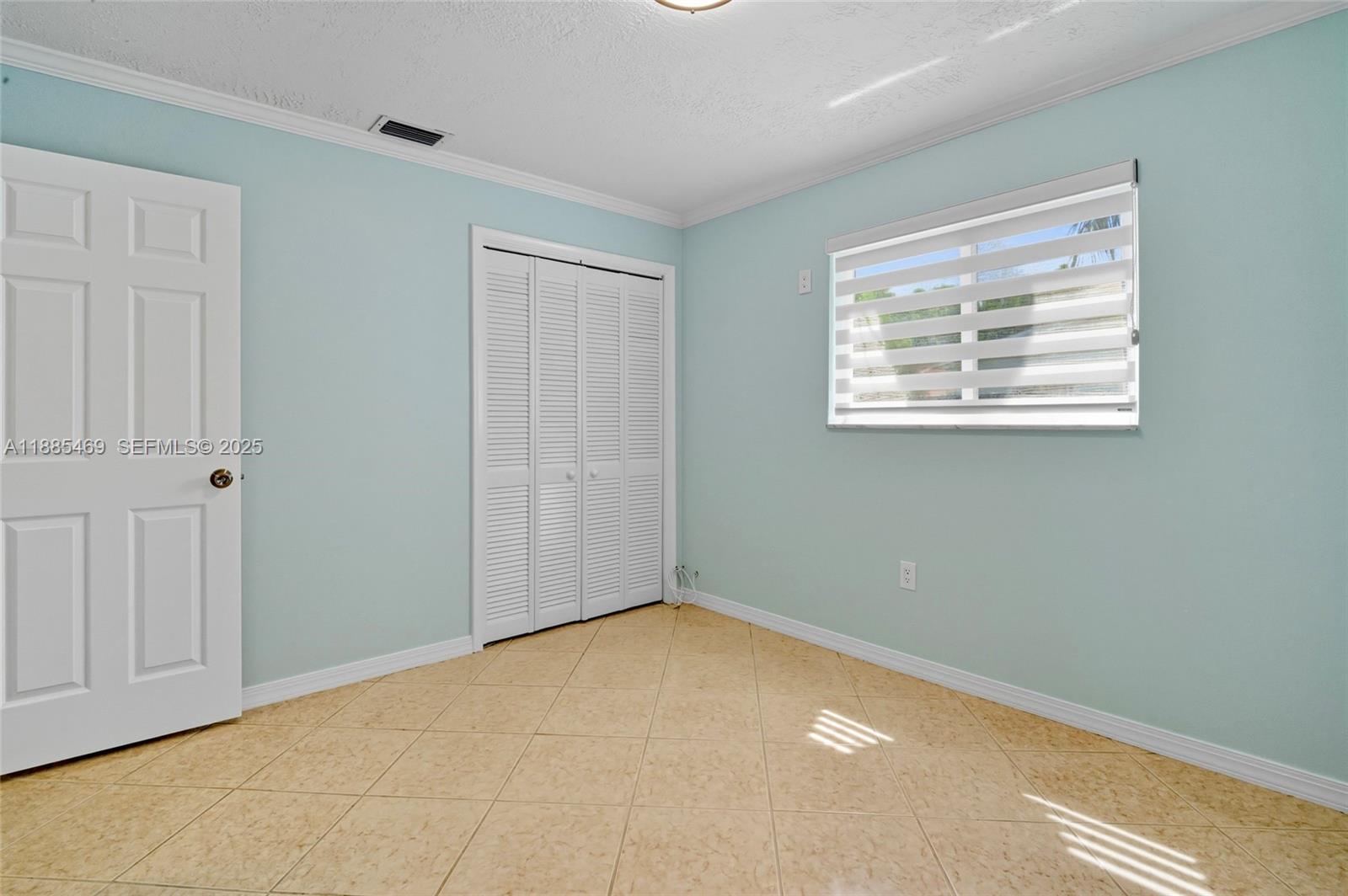 9710 Sunset Strip Sunrise, FL 33322 - Photo 21 of 33 Second Bedroom