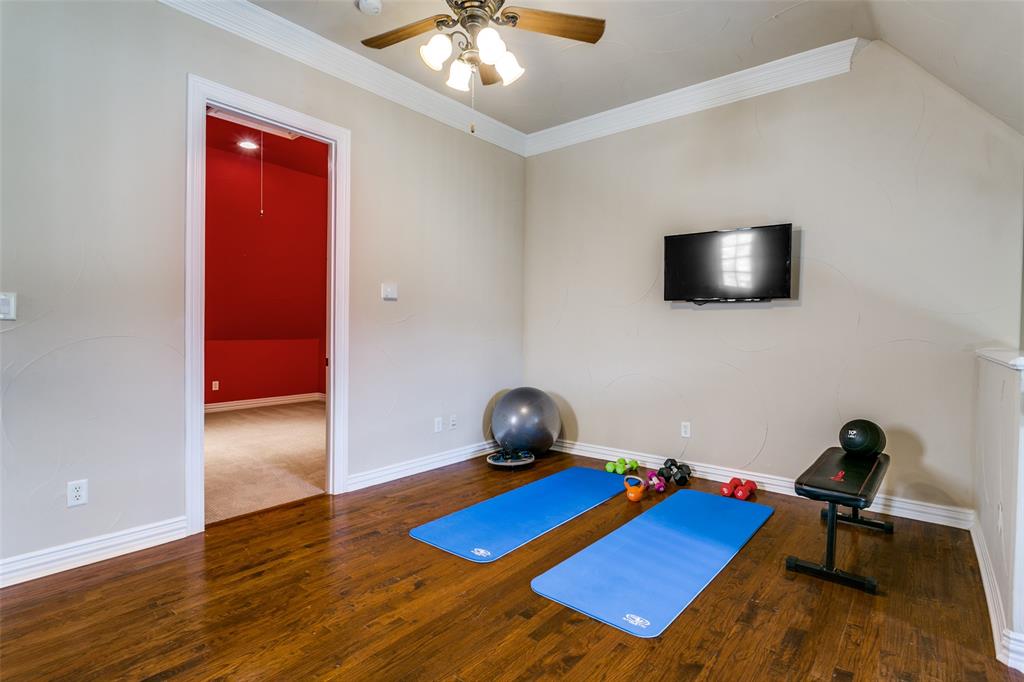 800 Rockingham Drive Irving, TX 75063 - Photo 28 of 35 a living room with furniture and a flat screen tv