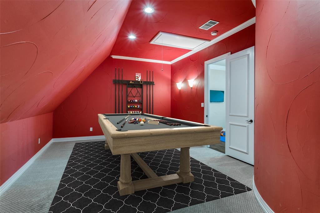 800 Rockingham Drive Irving, TX 75063 - Photo 32 of 35 Playroom with crown molding, carpet floors, lofted ceiling, billiards table virtually staged
