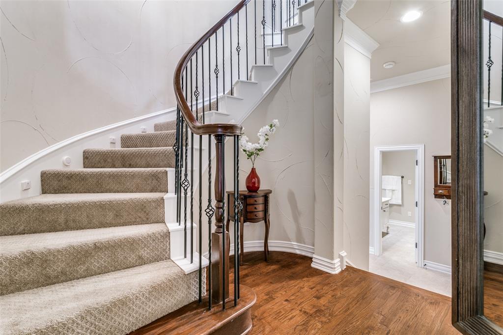 800 Rockingham Drive Irving, TX 75063 - Photo 6 of 35 Stairs featuring wood finished floors and crown molding