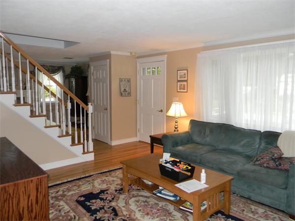 6 Richard Road Canton, MA 02021 - Photo 4 of 6 a living room with furniture and a window