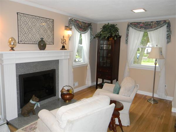 6 Richard Road Canton, MA 02021 - Photo 5 of 6 a living room with furniture a window and a fireplace
