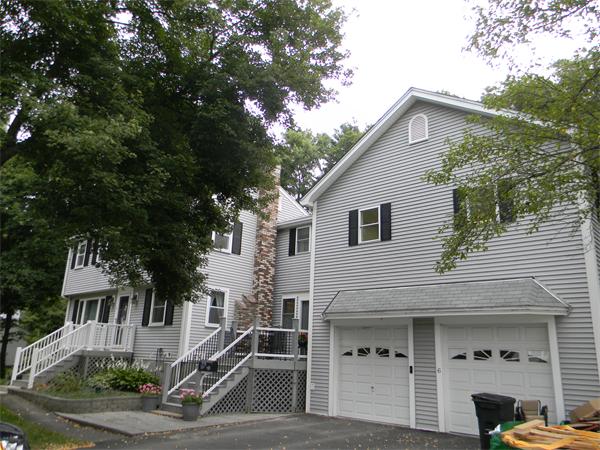 6 Richard Road Canton, MA 02021 - Photo 6 of 6 a view of a white house next to a yard