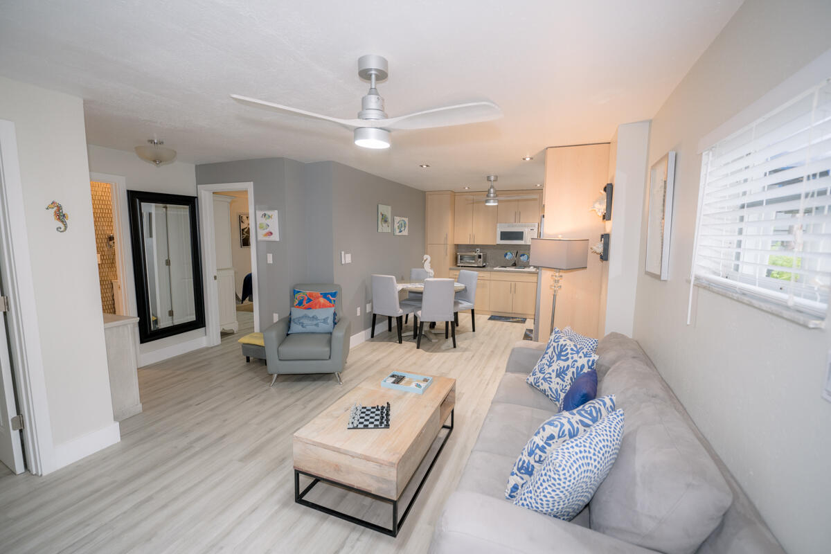 1016 Gibraltar Road Key Largo, FL 33037 - Photo 30 of 49 a living room with furniture and a wooden floor