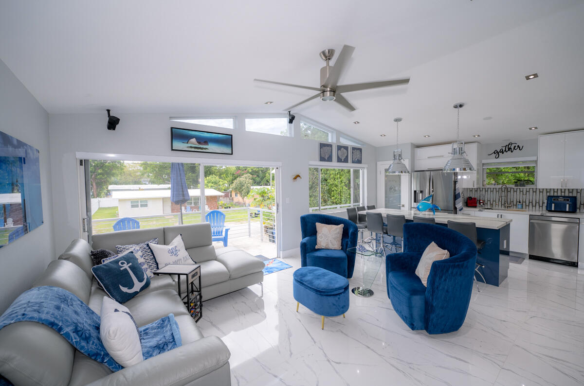 1016 Gibraltar Road Key Largo, FL 33037 - Photo 4 of 49 a living room with furniture and a large window
