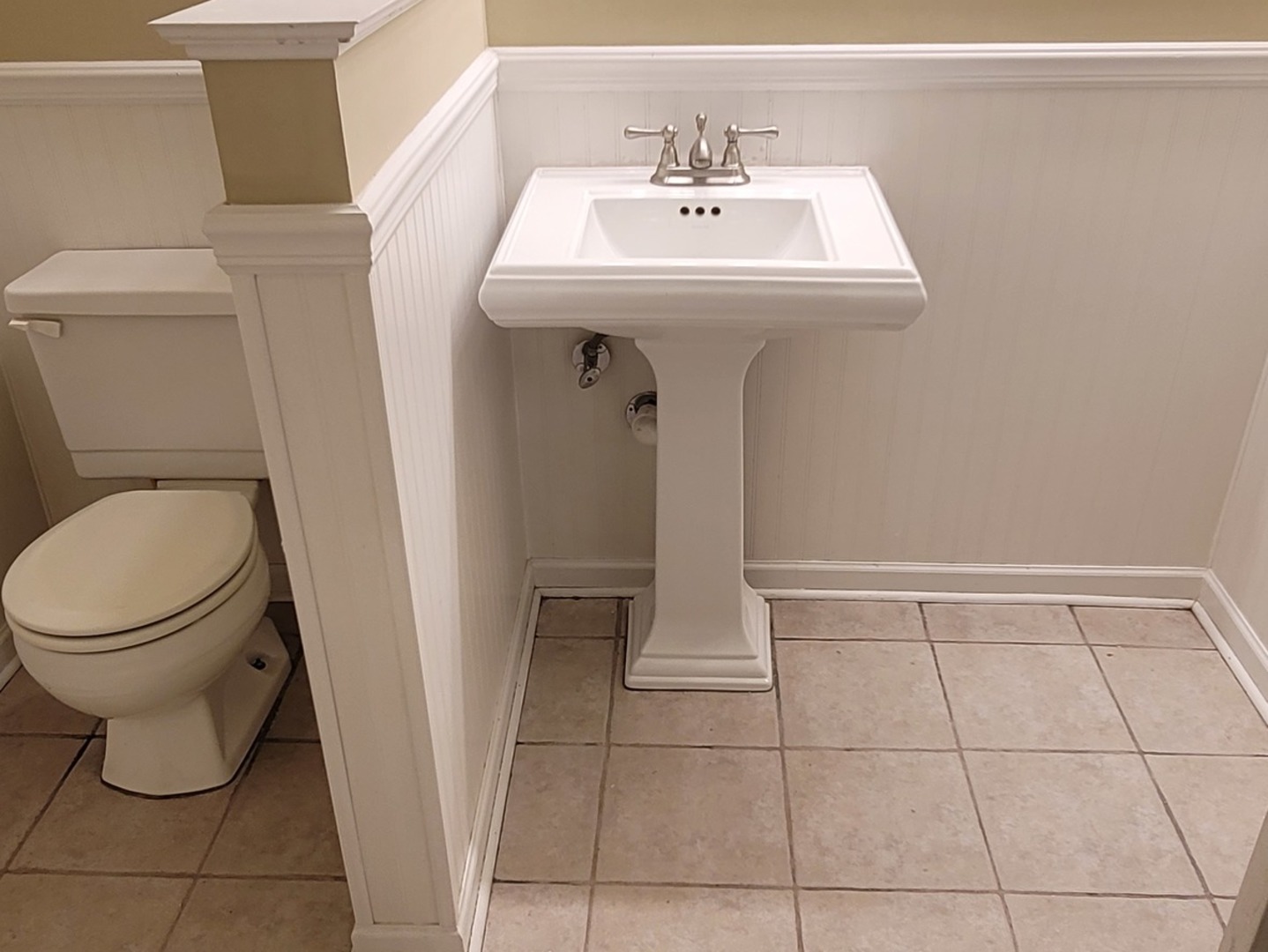 566 Timber Ridge Drive, Unit 203 Carol Stream, IL 60188 - Photo 13 of 17 a bathroom with a sink toilet and a mirror