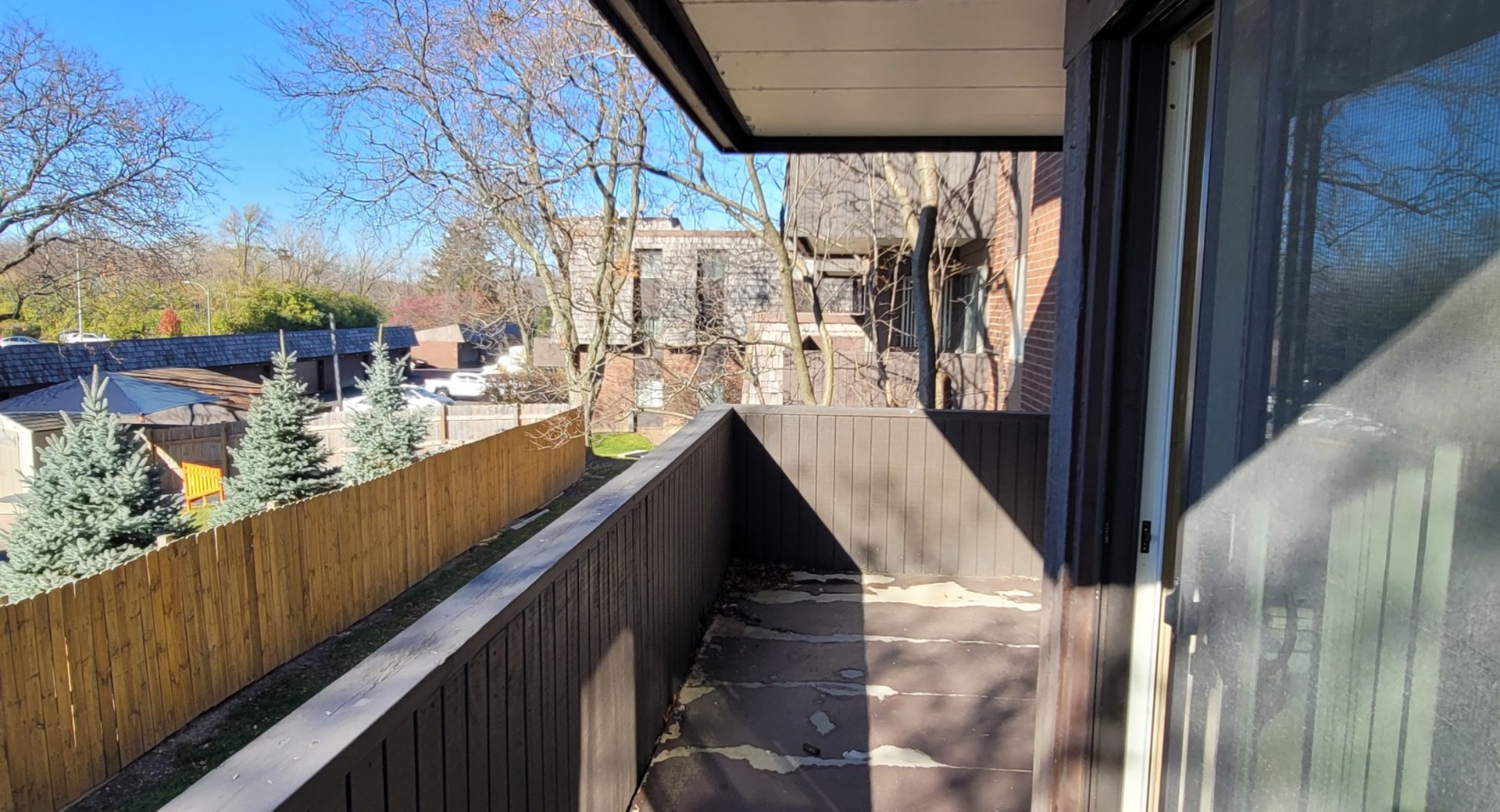 566 Timber Ridge Drive, Unit 203 Carol Stream, IL 60188 - Photo 14 of 17 a view of balcony with furniture