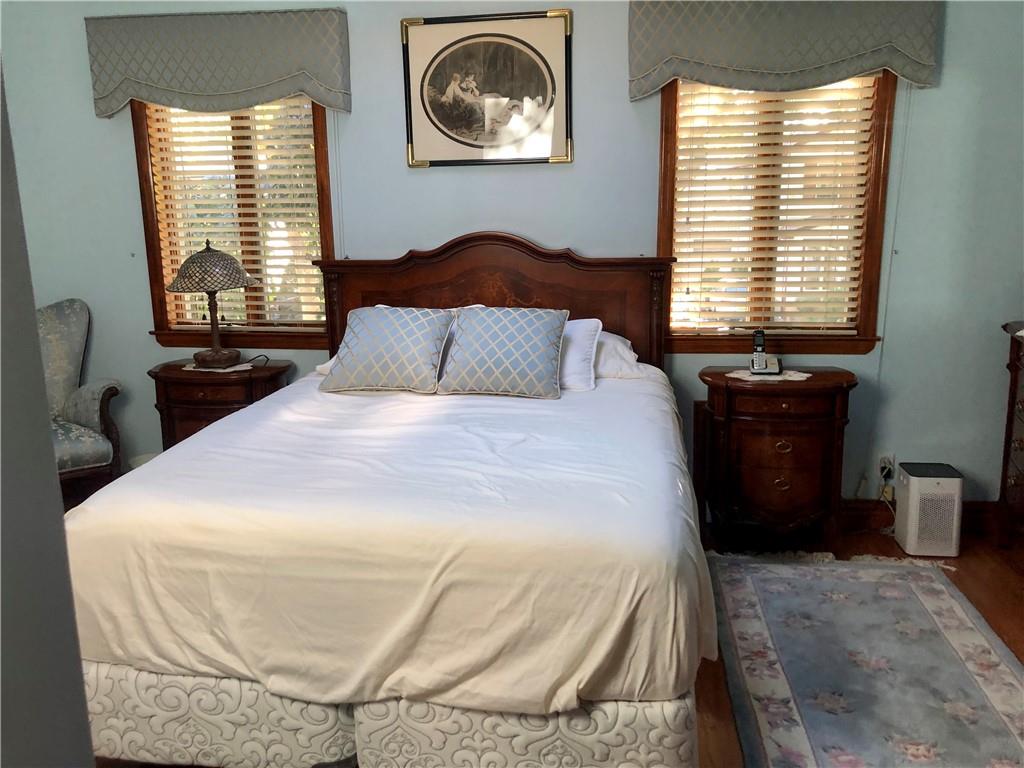 1933 Hendrickson Street Brooklyn, NY 11234 - Photo 11 of 17 a bedroom with a bed and a window