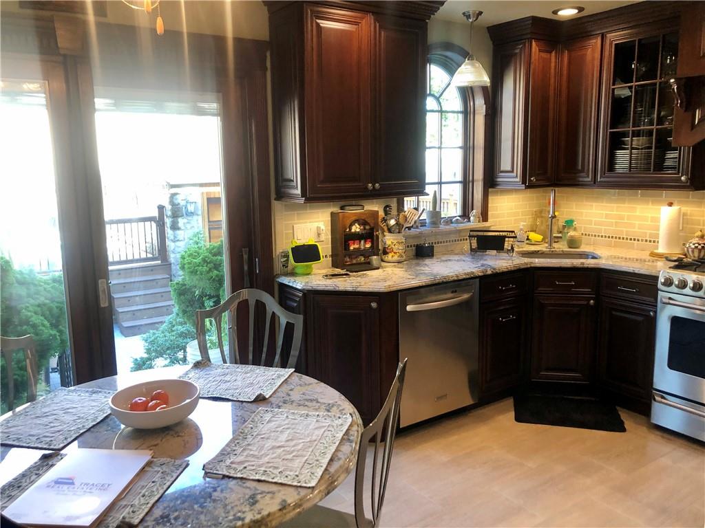 1933 Hendrickson Street Brooklyn, NY 11234 - Photo 4 of 17 a kitchen with a sink stove and microwave