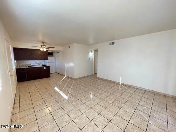 a view of a livingroom and entryway