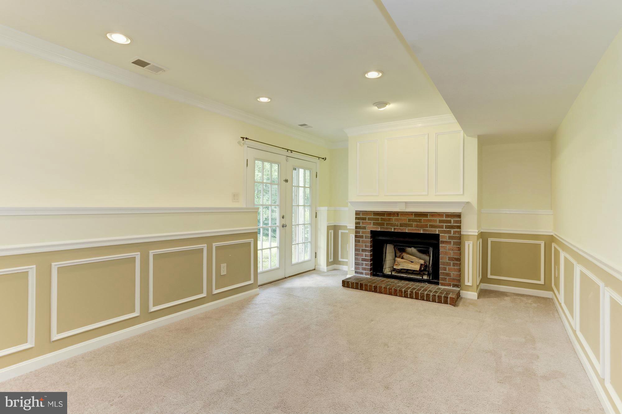 9110 Old Palmer Road Fort Washington, MD 20744 - Photo 24 of 30 Family Room in lower level walks out to backyard