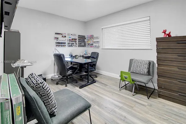 a kitchen with a refrigerator sink and stove