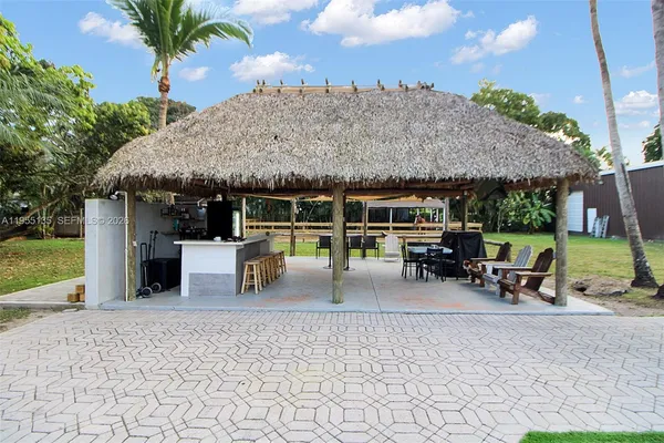 a bathroom with a shower and a sink