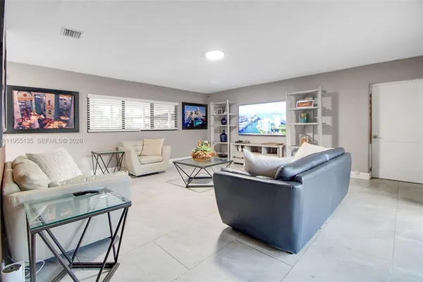 a bathroom with a shower and toilet