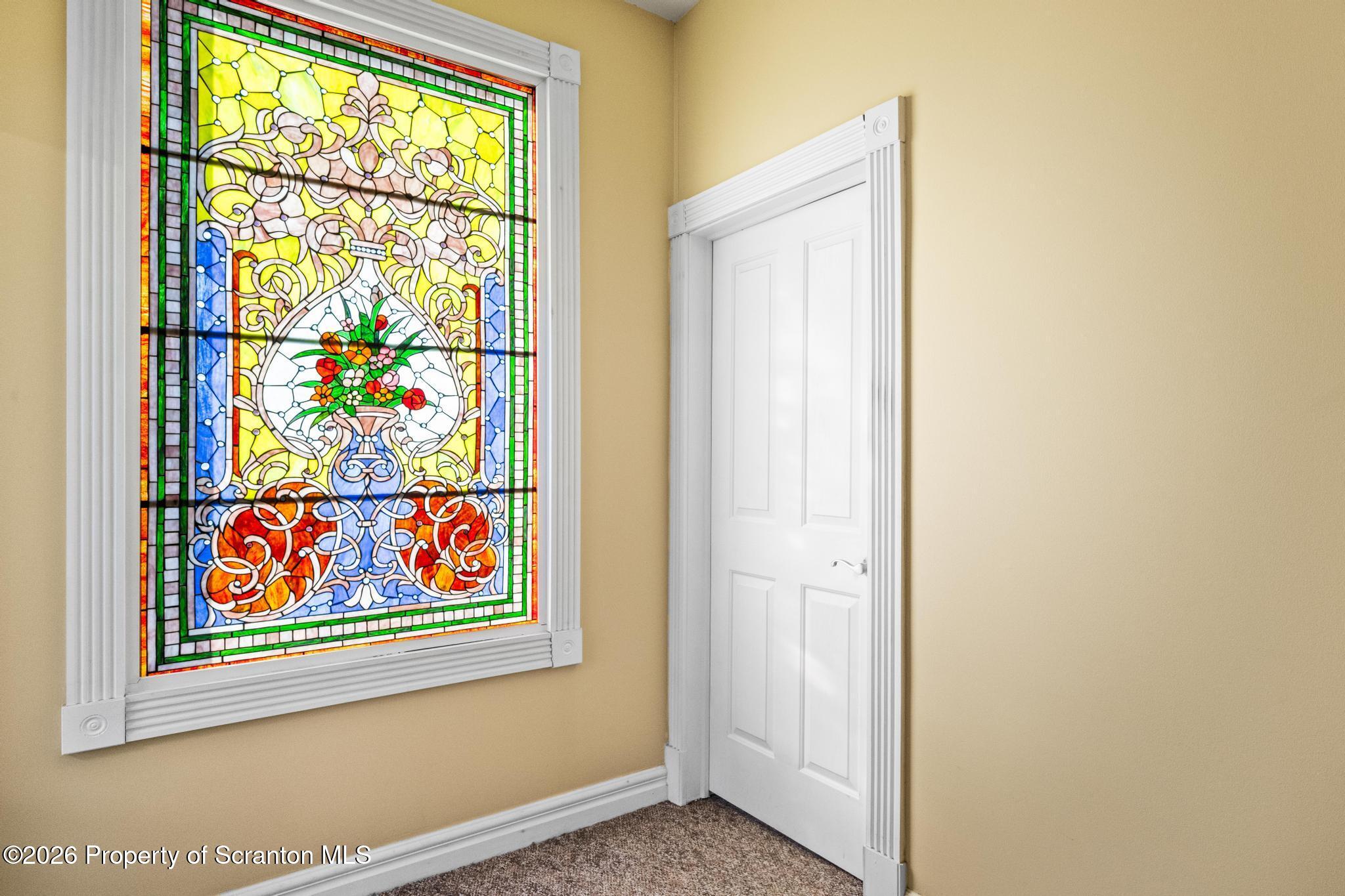 307 Lily Lake Road Dalton, PA 18414 - Photo 18 of 31 2nd Floor Center Hall Stained Glass