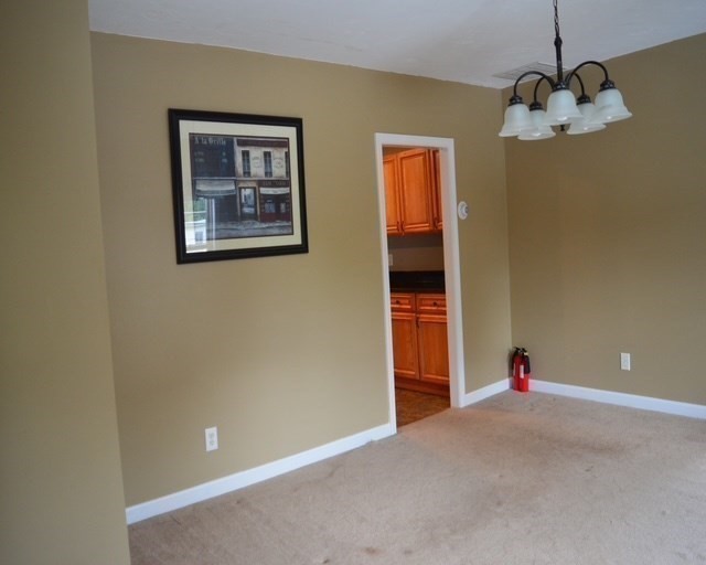 5 Anna Street Worcester, MA 01604 - Photo 9 of 19 a room with ceiling fan and window