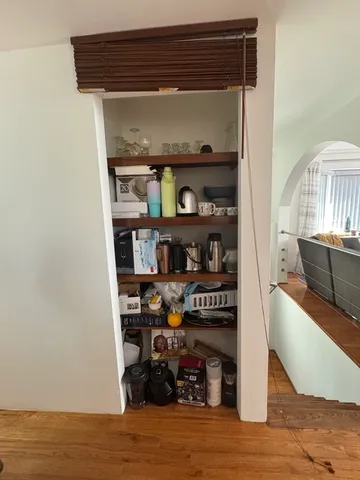 a living room with washer and dryer