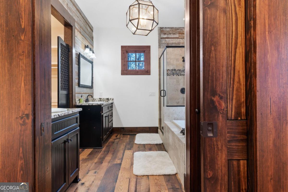 4096 Big Water E Road Sparta, GA 31087 - Photo 14 of 72 a kitchen with stainless steel appliances granite countertop a refrigerator and a stove top oven