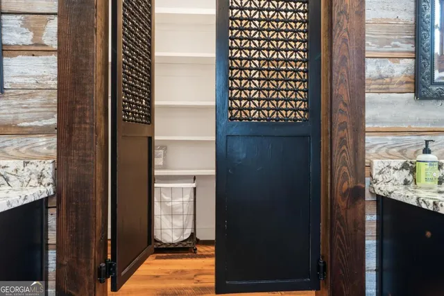 a view of a living room and dining room with furniture