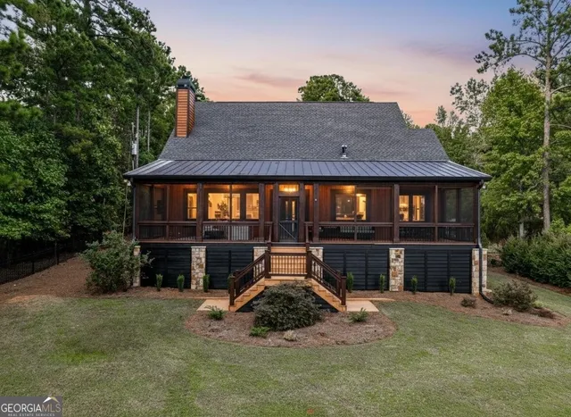 a front view of a house with yard