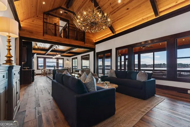 a living room with large windows