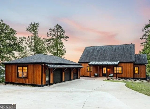 a view of a lake with a car parked in the background